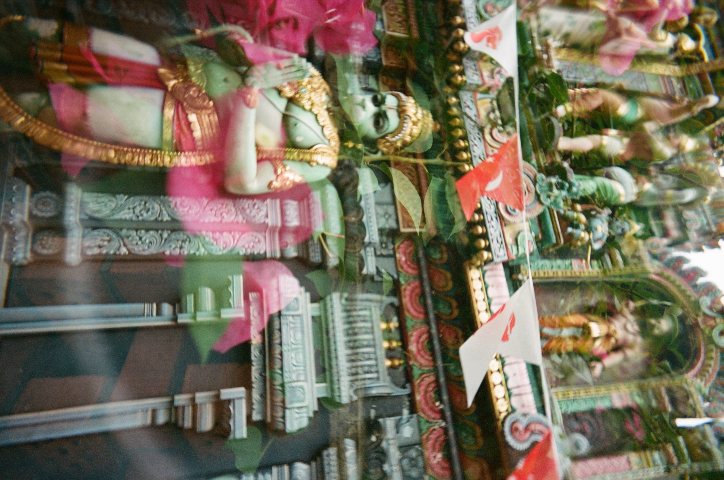 Colorful temple shrine and offerings